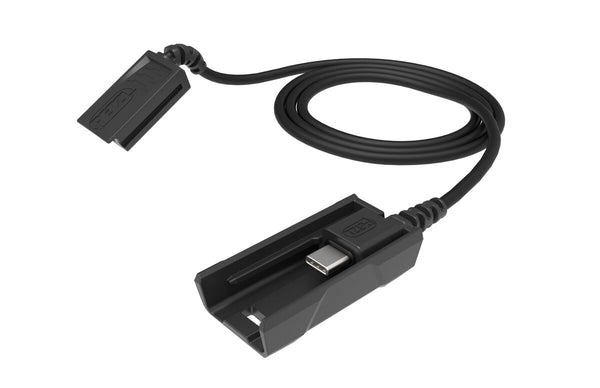 Black Petzl R1 extension cord for headlamps.