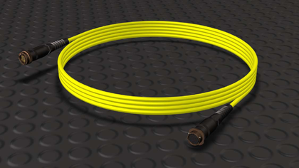 Coiled yellow P26 remote control cable with black circular connectors at both ends, displayed on a dark textured background.