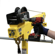 OZ Lifting Drill Drive Adapter in use with electric drill on yellow telescopic davit crane boom - imagen 4