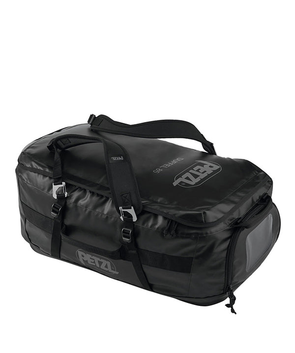 Petzl Duffel 85 Large Capacity Gear Bag – The Petzl Duffel 85 is a versatile, comfortable and practical gear bag with a large 85 liter capacity. The bag can be carried in multiple ways; the padded back shoulder straps make it a comfortable backpack and the removeable shoulder straps are also padded for cushioning when used as a shoulder bag. The Duffel 85 has a large suitcase style opening for easy access to equipment. The bag features a large pocket for a helmet or shoes and two pockets in the inner flap f